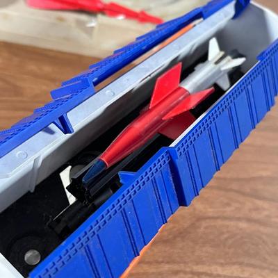 LOT 117L: Collection of Vintage Lionel Trains - Missile Launching Platform and Train Car, Exploding Ammunition Dump and More