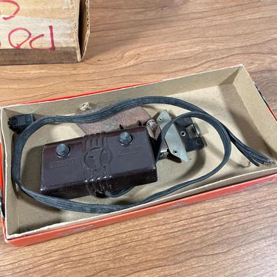 LOT 117L: Collection of Vintage Lionel Trains - Missile Launching Platform and Train Car, Exploding Ammunition Dump and More