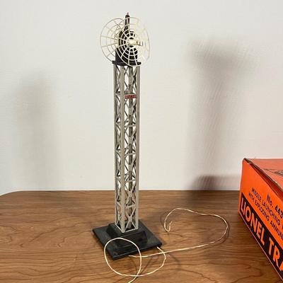 LOT 117L: Collection of Vintage Lionel Trains - Missile Launching Platform and Train Car, Exploding Ammunition Dump and More