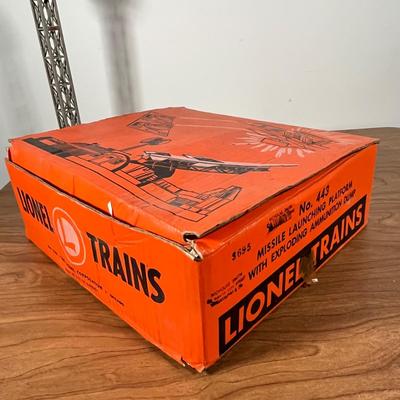 LOT 117L: Collection of Vintage Lionel Trains - Missile Launching Platform and Train Car, Exploding Ammunition Dump and More