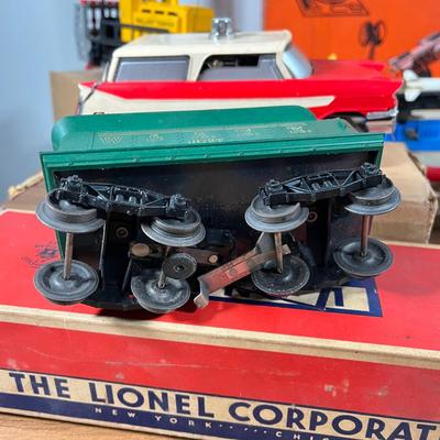 LOT 117L: Collection of Vintage Lionel Trains - Missile Launching Platform and Train Car, Exploding Ammunition Dump and More