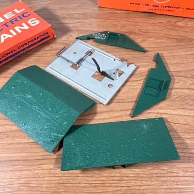 LOT 117L: Collection of Vintage Lionel Trains - Missile Launching Platform and Train Car, Exploding Ammunition Dump and More