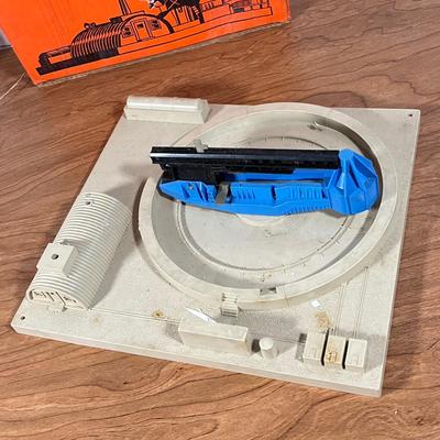 LOT 117L: Collection of Vintage Lionel Trains - Missile Launching Platform and Train Car, Exploding Ammunition Dump and More