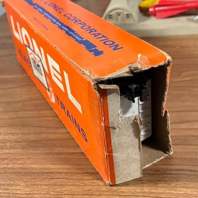 LOT 117L: Collection of Vintage Lionel Trains - Missile Launching Platform and Train Car, Exploding Ammunition Dump and More