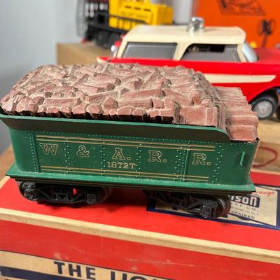 LOT 117L: Collection of Vintage Lionel Trains - Missile Launching Platform and Train Car, Exploding Ammunition Dump and More