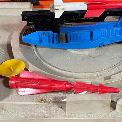LOT 117L: Collection of Vintage Lionel Trains - Missile Launching Platform and Train Car, Exploding Ammunition Dump and More