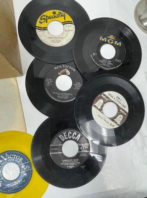 Lots of 45 rpm vinyl records in case - rare labels, yellow vinyl, green vinyl, Beatles, Walt Disney, Little Richard, etc
