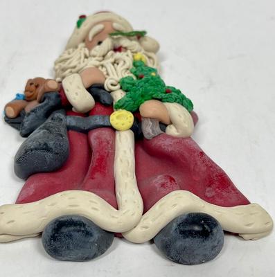 Vintage Clay Christmas Tree Ornament Santa with bag of toys and a tree