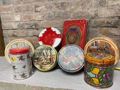 A bowl, vases, cat dispenser, a couple of grandma's sewing tins and a mystery???