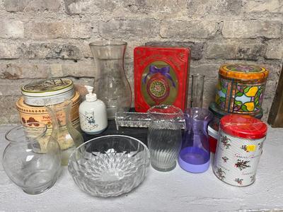 A bowl, vases, cat dispenser, a couple of grandma's sewing tins and a mystery???