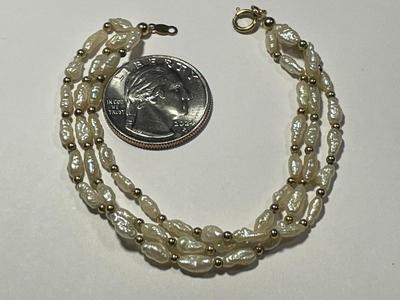 Vintage Preowned 14k Freshwater Pearl Triple Strand 6.5" Bracelet in Good Condition as Pictured. FREE DOMESTIC SHIPPING.