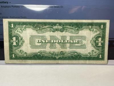 SERIES OF 1928-B FINE/VERY FINE CONDITION "FUNNY BACK" SILVER CERTIFICATE AS PICTURED.