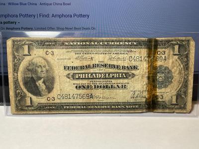Series of 1918 $1 Philadelphia National Currency Taped in Heavily Circulated Condition as Pictured.