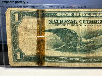 Series of 1918 $1 Philadelphia National Currency Taped in Heavily Circulated Condition as Pictured.
