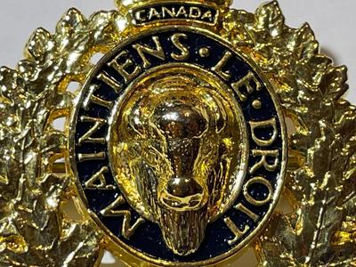 Scarce RCMP Royal Canadian Mounted Police Cap Badge -Gilt & Enameled in VG Preowned Condition.