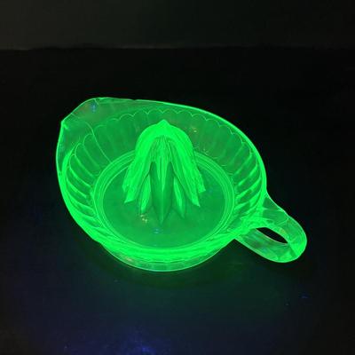 LOT 307: Vintage Uranium Glass Cake Platter w/Gold Trim along with a Uranium Glass Juicer