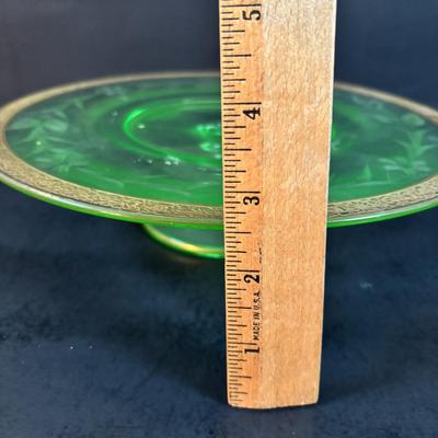 LOT 307: Vintage Uranium Glass Cake Platter w/Gold Trim along with a Uranium Glass Juicer