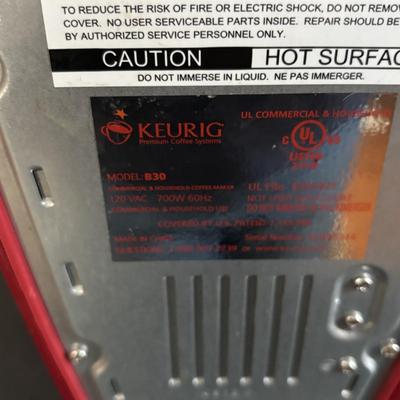 LOT 318: Keurig Model B30, Coffee Mugs, Candles, Quaker Lace Tablecloth & Organizing Basket