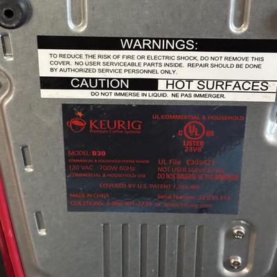 LOT 318: Keurig Model B30, Coffee Mugs, Candles, Quaker Lace Tablecloth & Organizing Basket