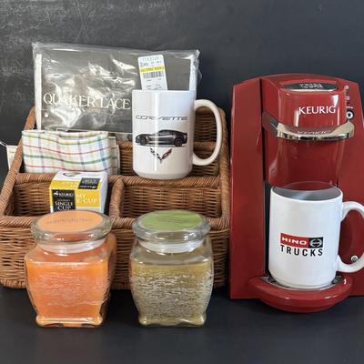 LOT 318: Keurig Model B30, Coffee Mugs, Candles, Quaker Lace Tablecloth & Organizing Basket
