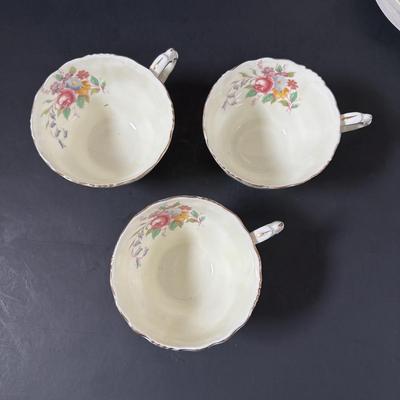 LOT 319: Vintage Paragon Fleur de Lis Teacups & Saucers