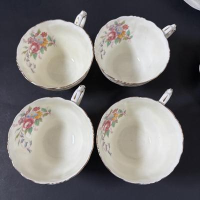 LOT 319: Vintage Paragon Fleur de Lis Teacups & Saucers