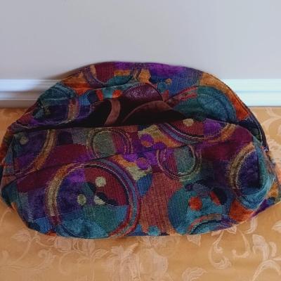 LOT 333: Erda Duffel Bag with Rolling Floral Tapestry Bag