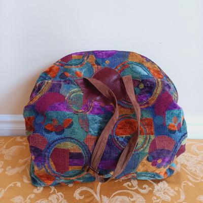 LOT 333: Erda Duffel Bag with Rolling Floral Tapestry Bag