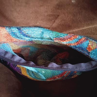 LOT 333: Erda Duffel Bag with Rolling Floral Tapestry Bag