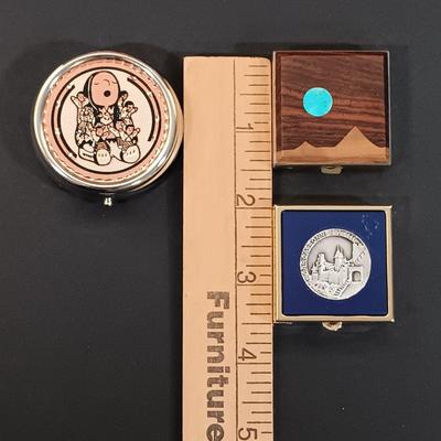 LOT 436: A Little Museum Collection- Folding Metal Book End, Stylized Letter Openers, Woven Shawl, Beaded Hummingbird & More