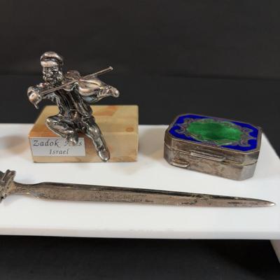 LOT 458: Sterling Silver Collection Letter Opener, A Mano Enameled Trinket Box, Zadok Arts Fiddler, Set of 6 Miniature Candle Holders