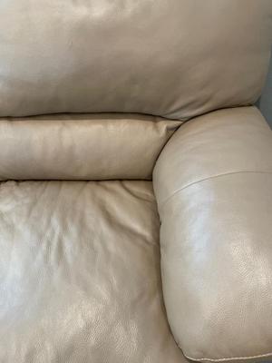 Lt Brown leather loveseat