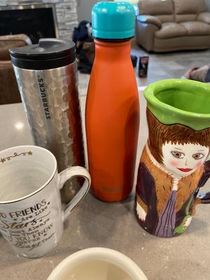 Coffee cups (2 pottery mugs by Reitz)