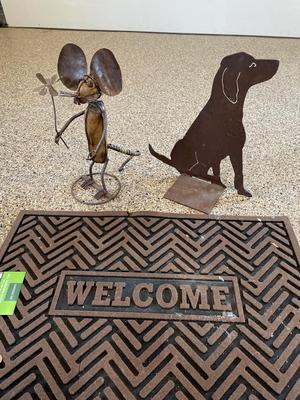 Metal yard art and welcome mat