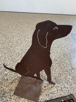 Metal yard art and welcome mat