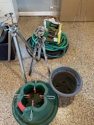 Hoses, sprinkler, tripods, pot, tree stand, tomato cage