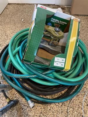 Hoses, sprinkler, tripods, pot, tree stand, tomato cage
