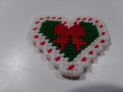 Heart shaped w/red bow tree ornament