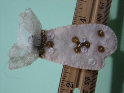 Hand crafted tiny mittens clip-on tree ornament
