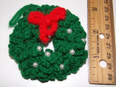 Double crocheted Christmas wreath tree ornament.