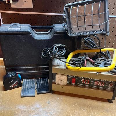 LOT 99B: Socket Set, Battery Charger, Shop Light and More