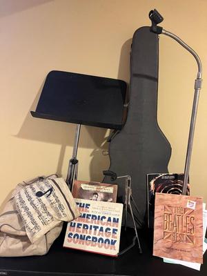 LOT 105B: Big Music Lot - Guitar Case, Sheet Music Stand and Books, Instrument and Mic Stands and More