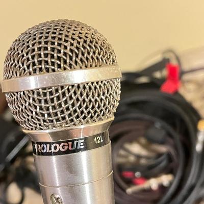 LOT 105B: Big Music Lot - Guitar Case, Sheet Music Stand and Books, Instrument and Mic Stands and More