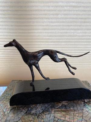 Greyhound statue on marble base by Cynthia Markle