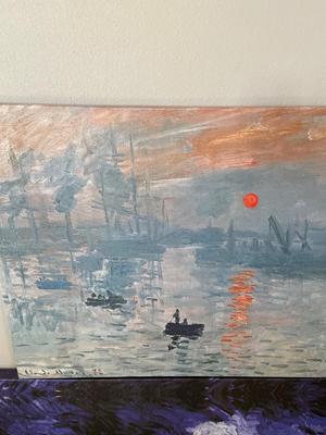 Two canvas wall art pieces