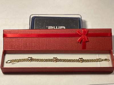 VINTAGE 14k PREOWNED HARDLY WORN 7.25" HEART DOUBLE ROPE BRACELET 4.4 (DWT) PENNYWEIGHTS TW IN VG CONDITION AS PICTURED.