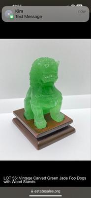 Lot 510: Beautiful Green Glass Foo Dog Sculptures on Wooden Stands