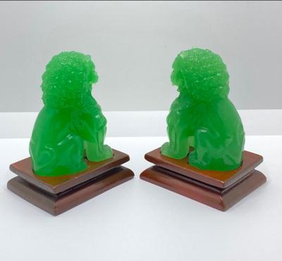 Lot 510: Beautiful Green Glass Foo Dog Sculptures on Wooden Stands
