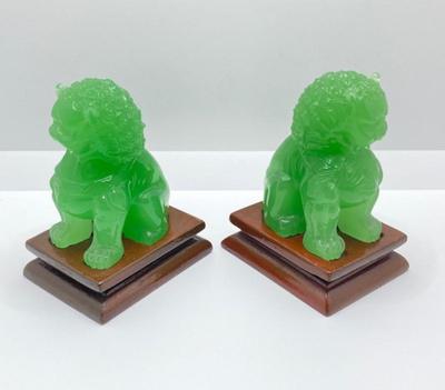 Lot 510: Beautiful Green Glass Foo Dog Sculptures on Wooden Stands