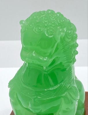 Lot 510: Beautiful Green Glass Foo Dog Sculptures on Wooden Stands